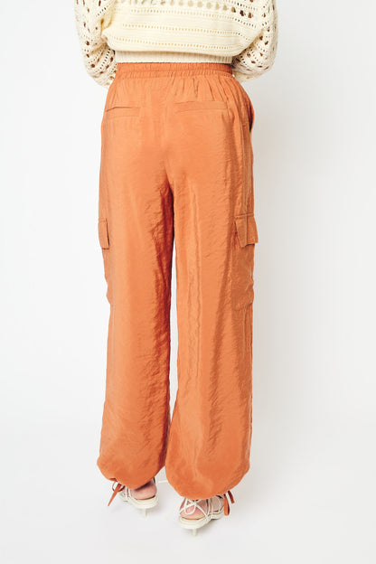 RE/BORN Antwerp Austin Casablanca Cupro trousers Tangine Orange