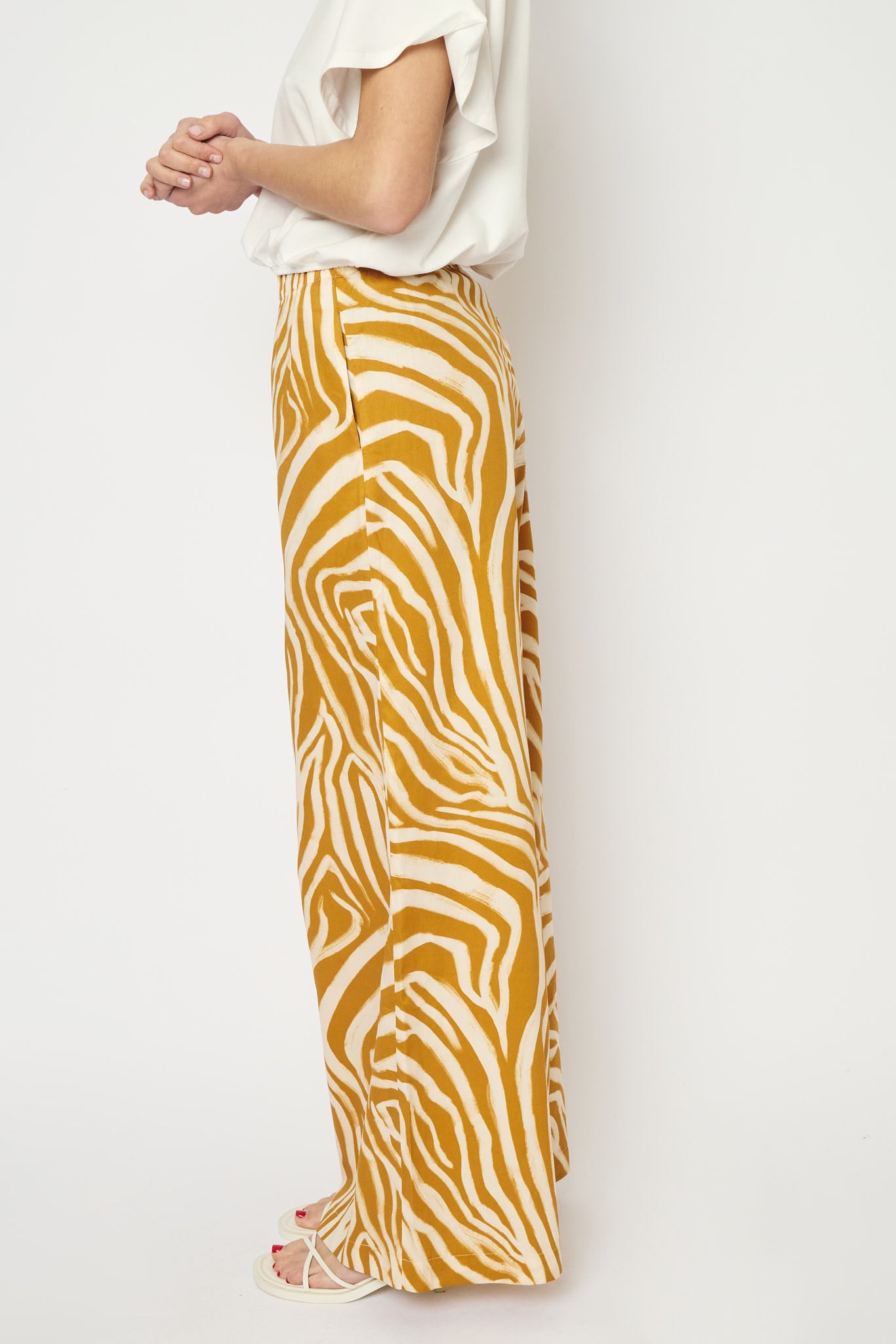 RE/BORN Antwerp Tina Zebra Print trousers Zebra Ochra