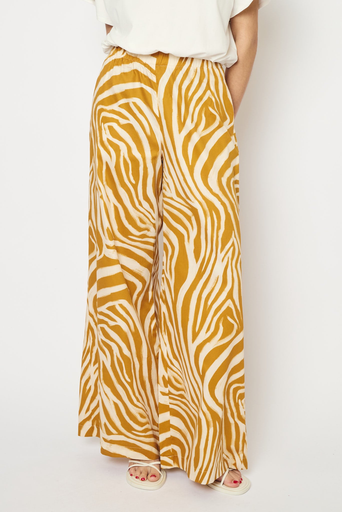 RE/BORN Antwerp Tina Zebra Print trousers Zebra Ochra