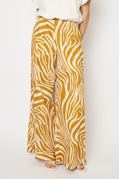 RE/BORN Antwerp Tina Zebra Print trousers Zebra Ochra