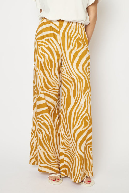RE/BORN Antwerp Tina Zebra Print trousers Zebra Ochra